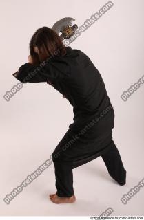 12 2019 01 JAKUB STANDING POSE WITH AX 2